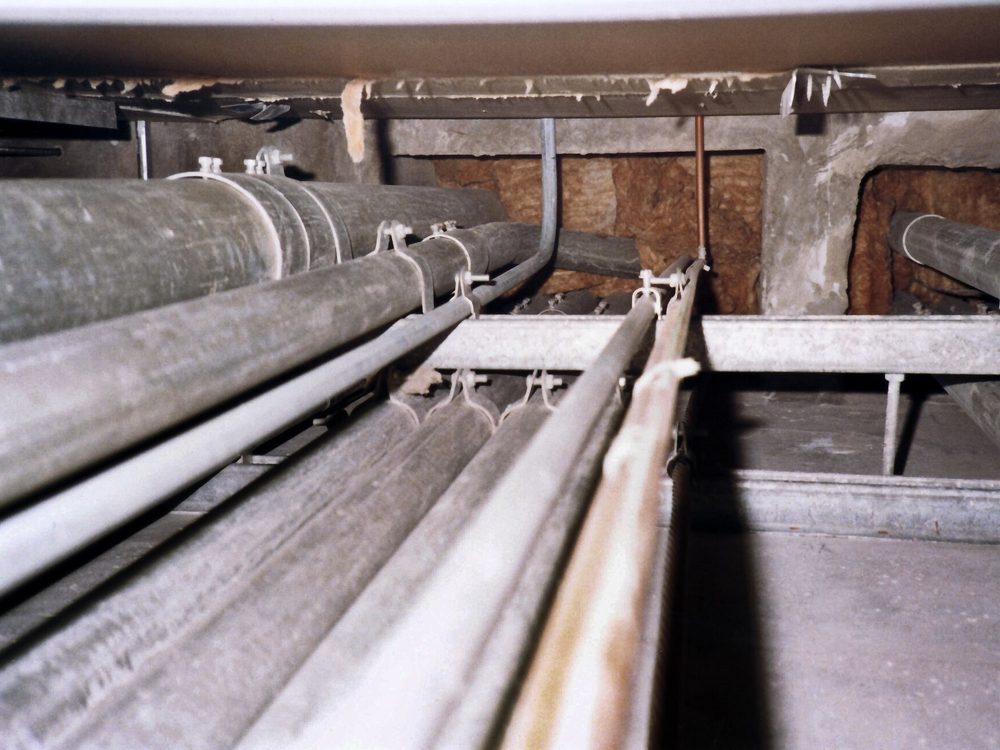 Conduit runs fixed along a ceiling